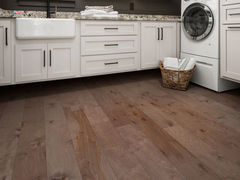 laundry room with hardwood